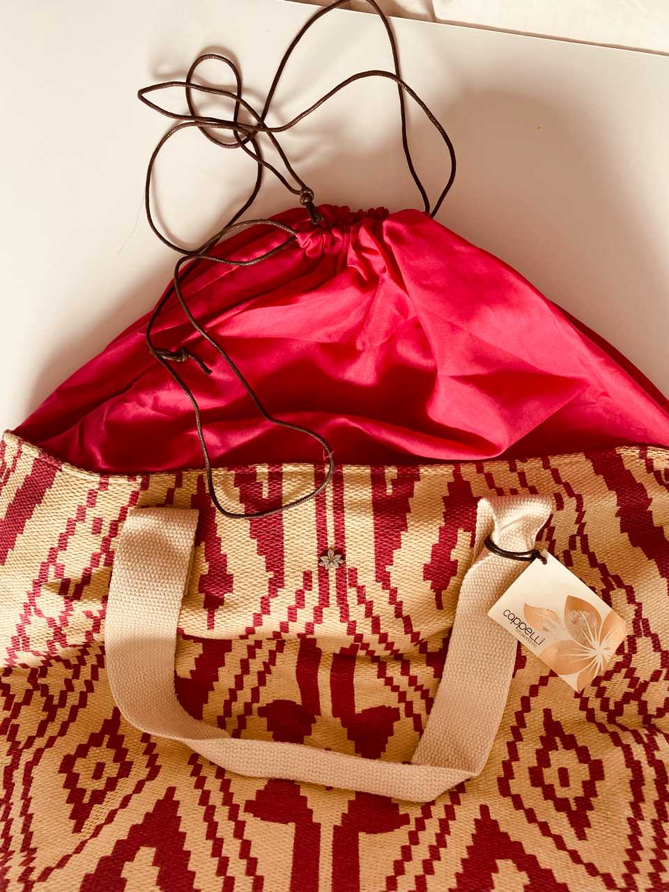 Pink and tan straw beach bag Cherchez La Femme brand